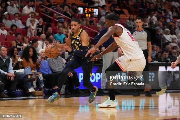 Tyrese Haliburton of the Indiana Pacers dribbles the ball during the game against the Miami Heat on February 8, 2023 at Miami-Dade Arena in Miami,...
