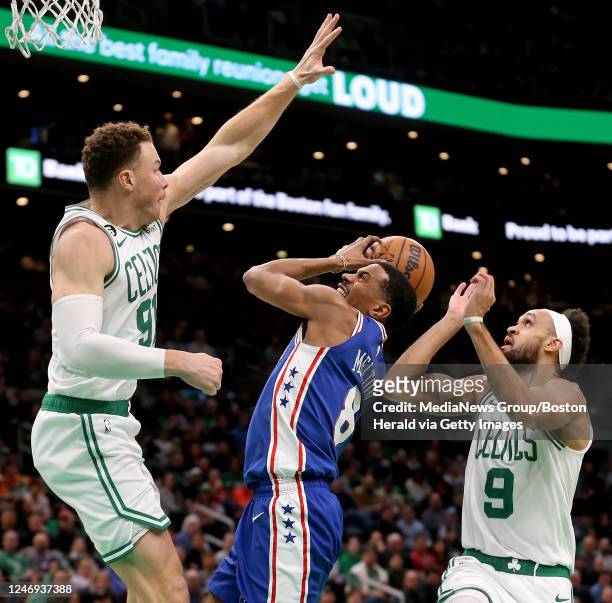 February 8: Blake Griffin and Derrick White of the Boston Celtics double team DeAnthony Melton of the Philadelphia 76ers during the first half of the...