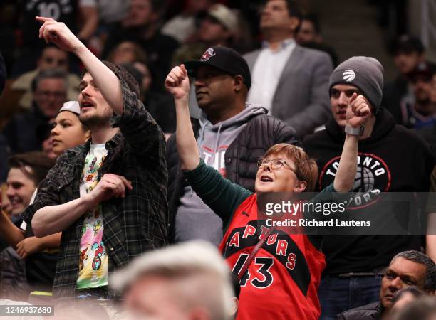 February 8 In second half action, fans in the crowd react to the game. The Toronto Raptors beat the San Antonio Spurs 112-98 in NBA basketball action...
