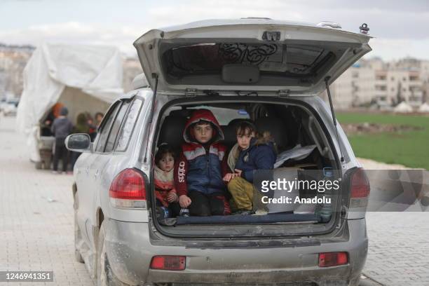 People stay in their vehicles after their houses damaged or collapsed in devastating 7.7 and 7.6 magnitude Kahramanmaras earthquakes in Afrin...