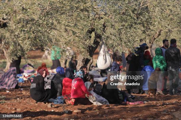 People stay outdoors after their houses damaged or collapsed in devastating 7.7 and 7.6 magnitude Kahramanmaras earthquakes in Afrin district of...