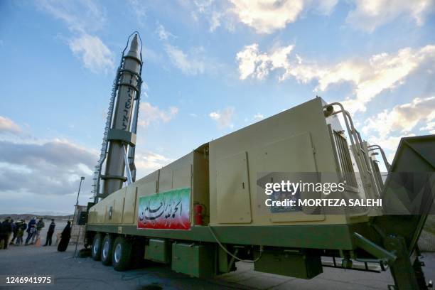 An Iranian long-range Ghadr missile displaying "Down with Israel" in Hebrew is pictured at a defence exhibition in city of Isfahan, central Iran, on...