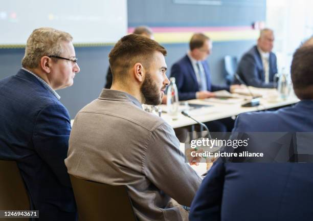February 2023, Hesse, Frankfurt/Main: Mario Vuskovic , player of the second-division soccer club Hamburger Sportverein , sits in the dock of the...