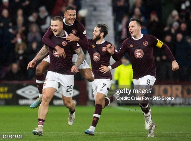 The Hearts players celebrate with Stephen Humphrys during a cinch Premiership match between Heart of Midlothian and Dundee United at Tynecastle, on...