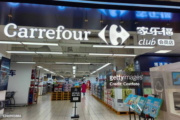Few customers shop at a Carrefour supermarket in Shanghai, China, February 9, 2023. Recently, some stores of Carrefour were exposed to problems such...