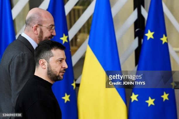 Ukraine's president Volodymyr Zelensky is welcomed by President of the European Council Charles Michel as EU leaders gather for a family picture...