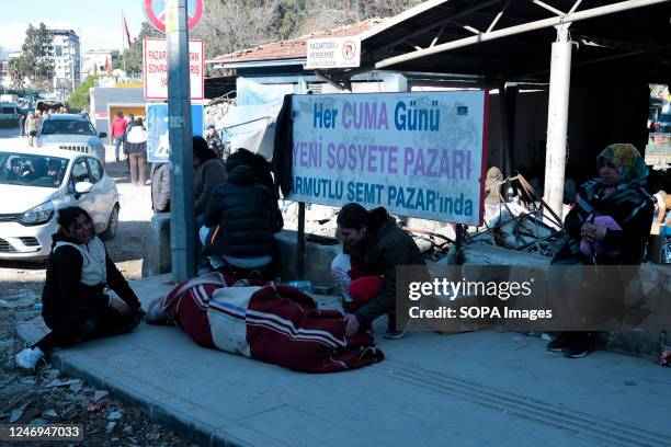 Woman mourns near to the body of her dead husband following the earthquake wreckage. Turkey experienced the biggest earthquake of this century in the...