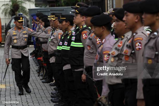 National Police Maintenance Agency Commissioner General Arief Sulistyanto inspects police medics and K-9 during a humanitarian mission discharge...