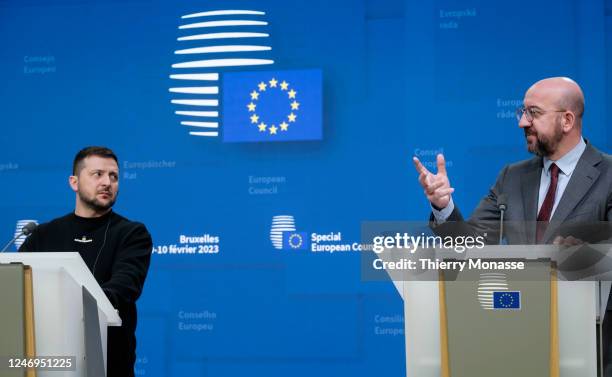 President of Ukraine Volodymyr Zelenskyy and the President of the European Council Charles Michel talk to media during a press conference following...