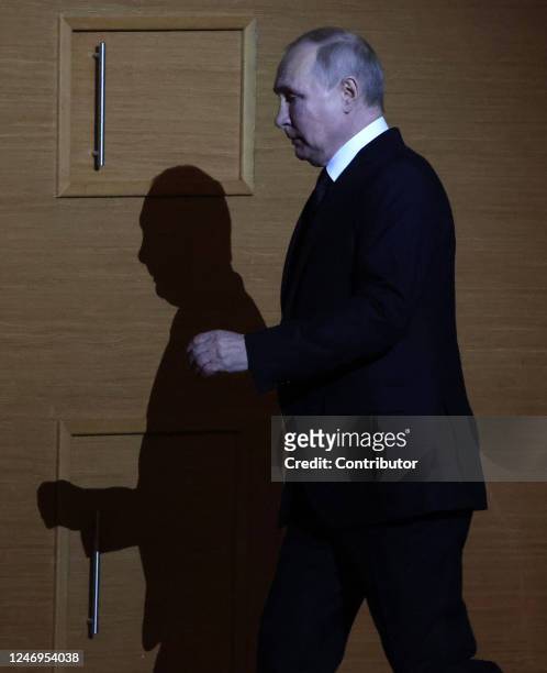 Russian President Vladimir Putin enters the hall during an event marking the 100th anniversary of domestic civil aviation at the State Kremlin...