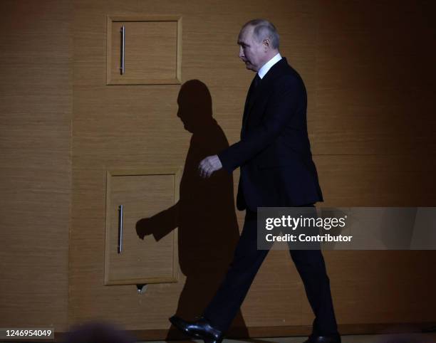 Russian President Vladimir Putin enters the hall during an event marking the 100th anniversary of domestic civil aviation at the State Kremlin...