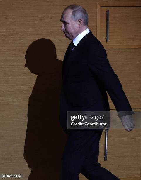 Russian President Vladimir Putin enters the hall during an event marking the 100th anniversary of domestic civil aviation at the State Kremlin...