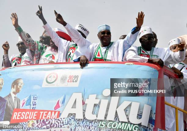 Candidate of the opposition Peoples Democratic Party Atiku Abubakar , among party stalwarts, arrive to attend a campaign rally in Kano, northwest...