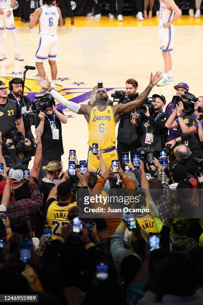 LeBron James of the Los Angeles Lakers throws chalk in the air before the game against the Oklahoma City Thunder on February 7, 2023 at Crypto.Com...