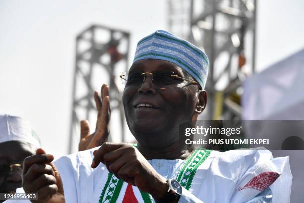 Candidate of the opposition Peoples Democratic Party Atiku Abubakar gestures during a campaign rally in Kano, northwest Nigeria, on February 9 ahead...