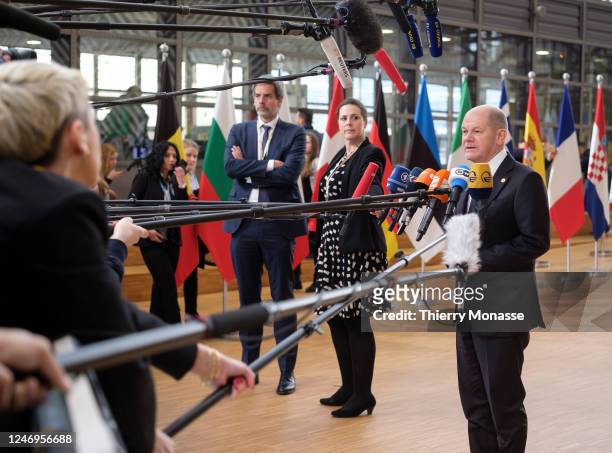 German Chancellor Olaf Scholz is talking to media prior the start of an European Union leaders summit at the European Council headquarters on...