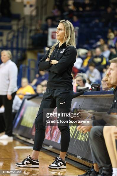 Buffalo Bulls head coach Becky Burke watches the action on the court ...
