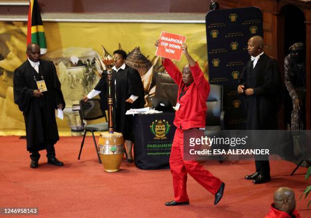 Opposition Economic Freedom Fighters party leader Julius Malema protest on stage as South African President Cyril Ramaphosa attempts to deliver his...