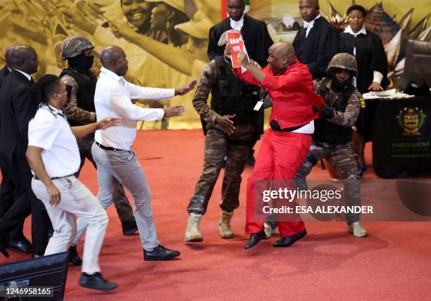 Opposition Economic Freedom Fighters party leader Julius Malema is removed by presidential task force as South African President Cyril Ramaphosa...