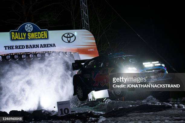 Pierre Loubet of France and his co-driver Nicolas Gilsoul of Belgium steer their Ford Puma Rally 1 HYBRID during the 1st stage of the Rally Sweden,...