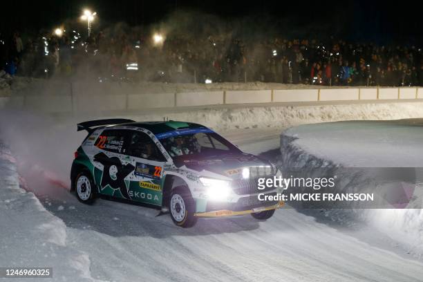 Emil Lindholm of Finland and his co driver Reeta Hamalainen of Finland steer their Skoda Fabia RS during the 1st stage of the Rally Sweden, second...