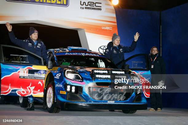 Ott Tanak of Estonia and Martin Jarveoja of Estonia stand by their Ford Puma Rally1 HYBRID during the 1st stage of the Rally Sweden, second round of...