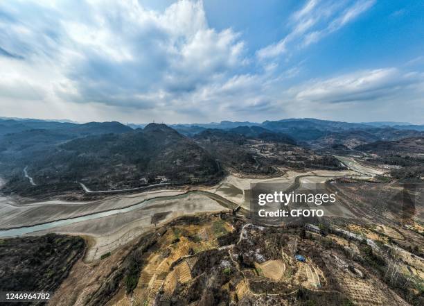 Aerial photo shows the falling water level of the Biyang River Reservoir in Qixingguan district of Bijie City, Southwest China's Guizhou Province,...