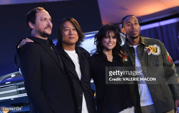 Director Louis Leterrier, actors Sung Kang, Michelle Rodriguez and Chris "Ludacris" Bridges arrive for "Fast X" trailer launch at the LA Live Event...