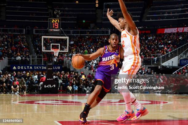 Chris Paul of the Phoenix Suns dribbles the ball during the game against the Atlanta Hawks on February 9, 2023 at State Farm Arena in Atlanta,...