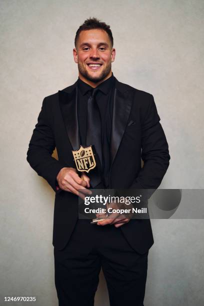 Nick Bosa poses for a photo after winning Defensive Player of the Year during NFL Honors at the Symphony Hall on February 9, 2023 in Phoenix, Arizona.