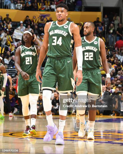 Giannis Antetokounmpo Jrue Holiday and Khris Middleton of the Milwaukee Bucks looks on during the game on February 9, 2023 at Crypto.Com Arena in Los...