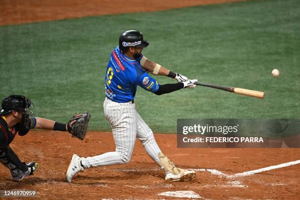 Venezuela's Leones del Caracas outfielders Jose Rondo hits the ball during the Caribbean Series semi final game against Colombia's Vaqueros de...