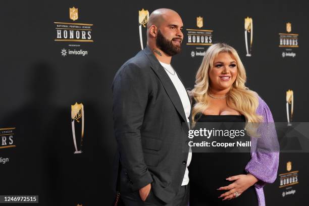 Lawrence Guy and Andrea Aparicio pose for a photo on the red carpet during NFL Honors at the Symphony Hall on February 9, 2023 in Phoenix, Arizona.