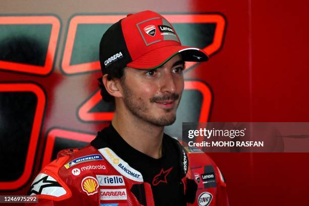 Ducati Lenovo's Italian rider Francesco Bagnaia walks inside his team garage during the first day of the pre-season MotoGP winter test at the Sepang...