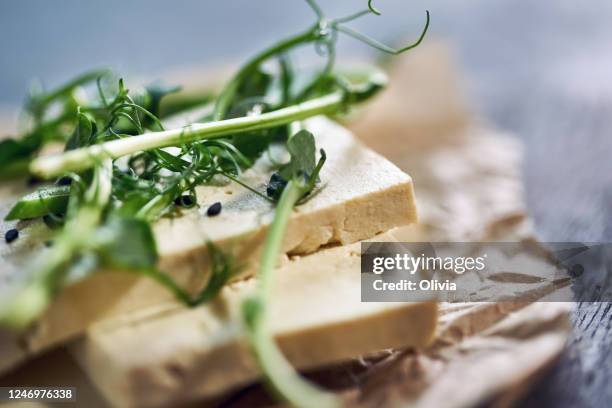 classic tofu cheese on a wooden board. - soy cheese stock pictures, royalty-free photos & images