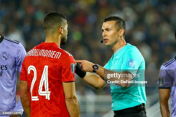 Mohamed Abdelmonem of Al Ahly and referee Andres Matonte talk to each other during the FIFA Club World Cup Morocco 2022 Semi Final match between Al...