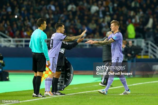 Dani Ceballos of Real Madrid and Toni Kroos of Real Madrid are substituted during the FIFA Club World Cup Morocco 2022 Semi Final match between Al...