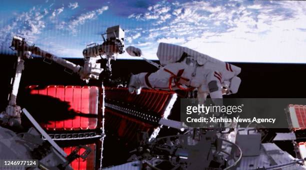 This screen image captured at Beijing Aerospace Control Center on Feb. 9, 2023 shows Shenzhou-15 taikonaut Fei Junlong returning to space station lab...