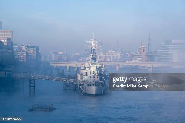 Thick fog over the capital looking towards HMS Belfast making a peaceful yet eerie atmosphere as structures appear and disappear over the River...