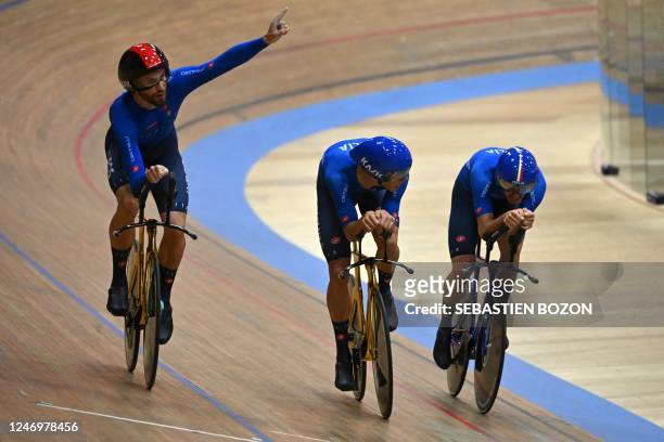 Italys Filippo Ganna, Jonathan Milan and Manlio Moro, celebrate at the end of the mens team pursuit race during the UEC Track Elite European...