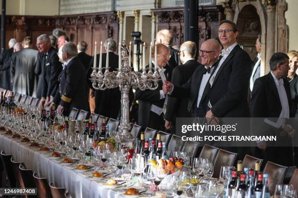 Participants to the 479th 'Schaffermahlzeit' banquet gather in the upper banqueting hall of the historic city hall of Bremen, northern Germany, on...