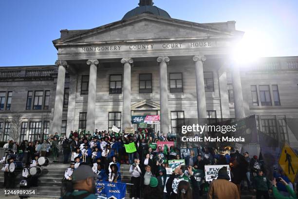 Philadelphia Eagles area resident fans, local university mascots, and a high school marching band gathered on the steps of Montgomery County...