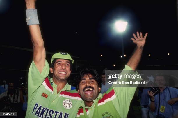 Wasim Akram and Javed Miandad celebrate after Pakistan beat England in the final of the Cricket World Cup at the MCG in Melbourne, Australia.