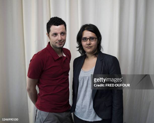 Juliana Rojas and Marco Dutra, Brazilian directors of the movie "Trabalhar Cansa" presented in the Un Certain Regard selection pose during a photo...