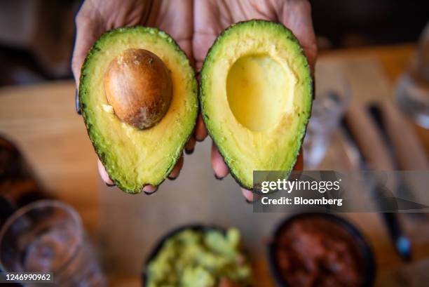 An avocado arranged at a restaurant in Hastings-on-Hudson, New York, US, on Friday, Feb. 10, 2023. The price of chicken wings has plunged 22% from...