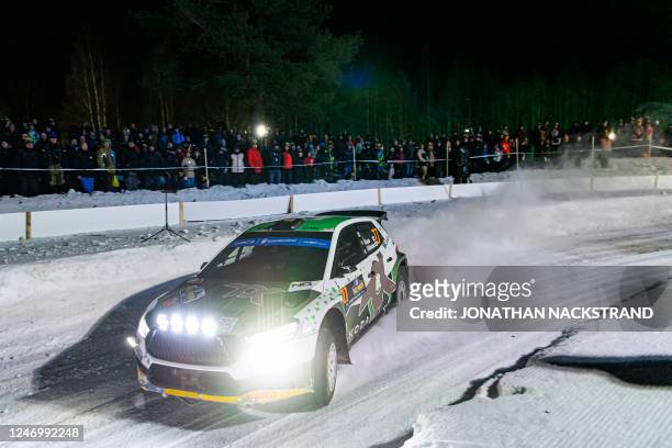 Nikolay Gryazin and his co-driver Konstantin Aleksandrov, both representing Authorised Neutral Athlete, steer their Skoda Fabia RS during the 8th...