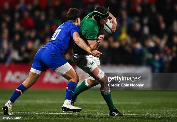 Cork , Ireland - 10 February 2023; James McNabney of Ireland is tackled by Tom Raffy of France during the U20 Six Nations Rugby Championship match...