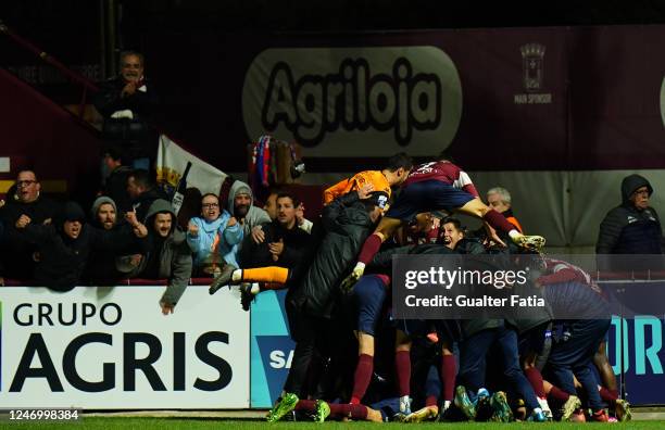 Simao Rocha of SCU Torreense celebrates with teammates after scoring a goal during the Liga Portugal 2 match between SCU Torreense and Moreirense FC...