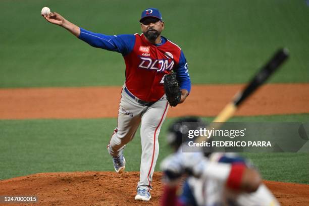 Dominican Republic's Tigres de Licey pitcher Cesar Valdez throws the ball during the Caribbean Series game final against Venezuela's Leones del...