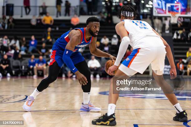 David Nwaba of the Motor City Cruise handles the ball against Ousmane Dieng of the Oklahoma City Blue on February 10, 2023 at Wayne State Fieldhouse...